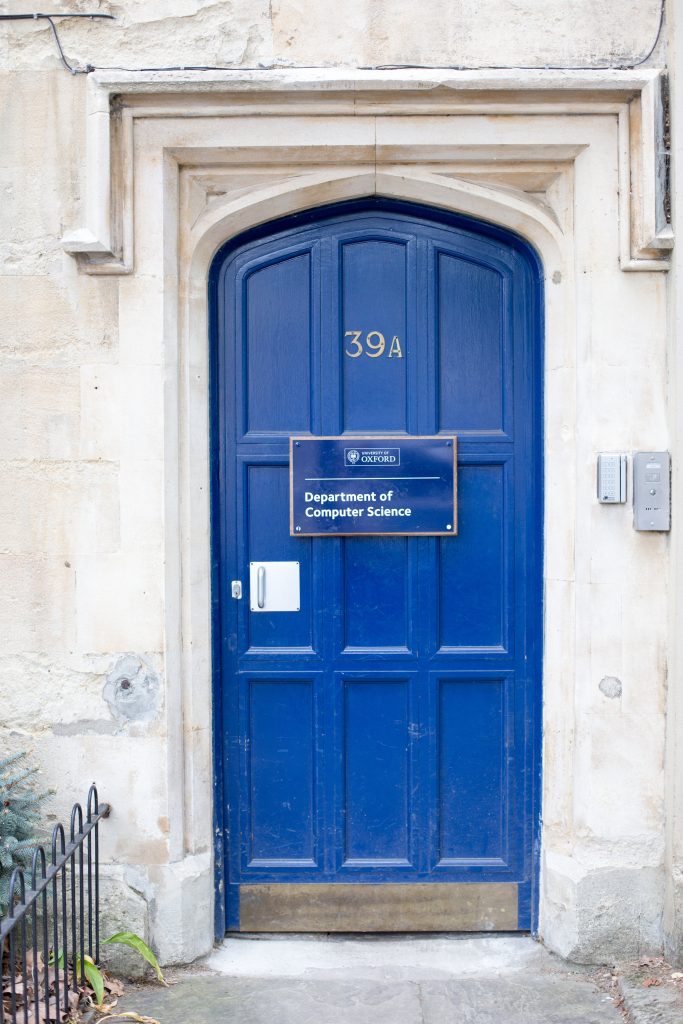 A blue door with the number 39A on and a sign reading 'Department of Computer Science'