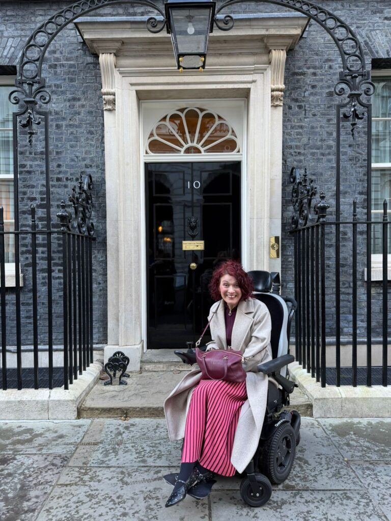Lucy outside the front door of No 10 Downing Street